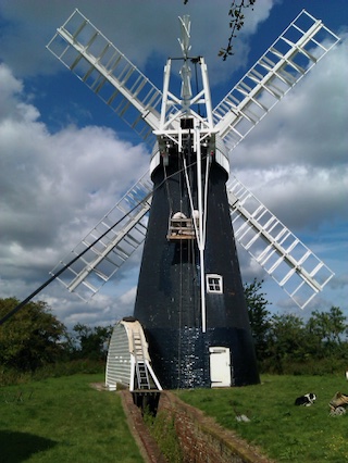 Painting the tower of a windmill - Jonathan Pulfer